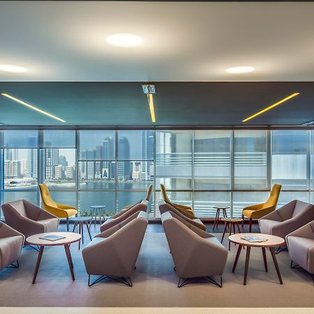 The Act Hotel Шарджа Зручності фото The lounge at the airport