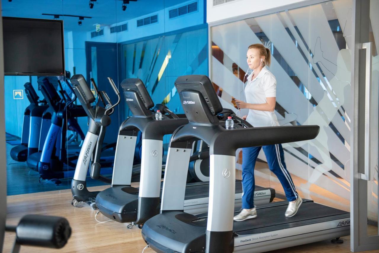 The Act Hotel Шарджа Екстер'єр фото A treadmill