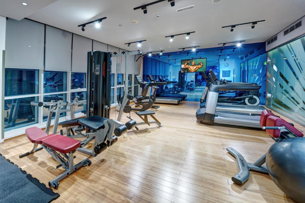 The Act Hotel Шарджа Екстер'єр фото The gym at the hotel