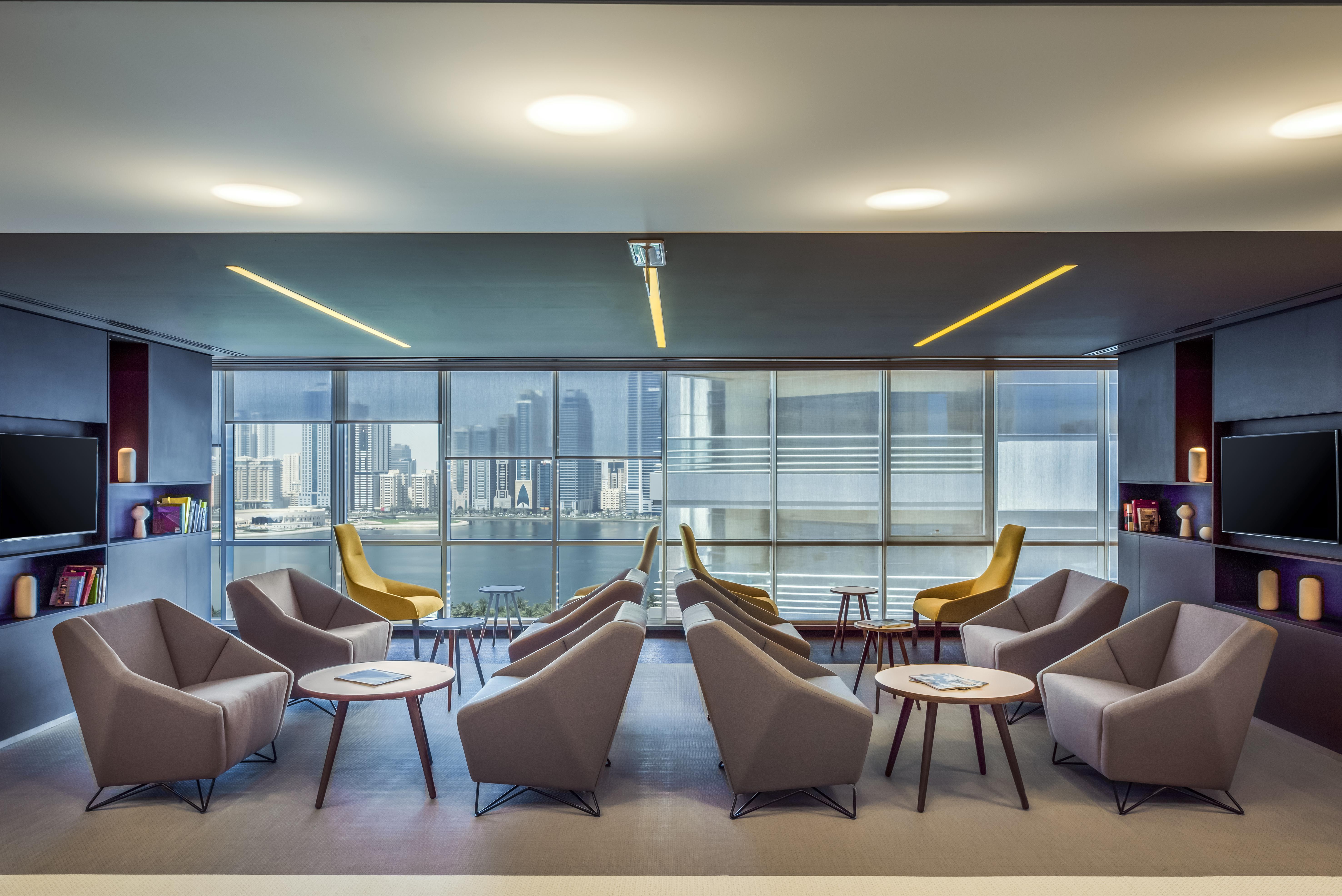 The Act Hotel Шарджа Зручності фото The lounge at the airport
