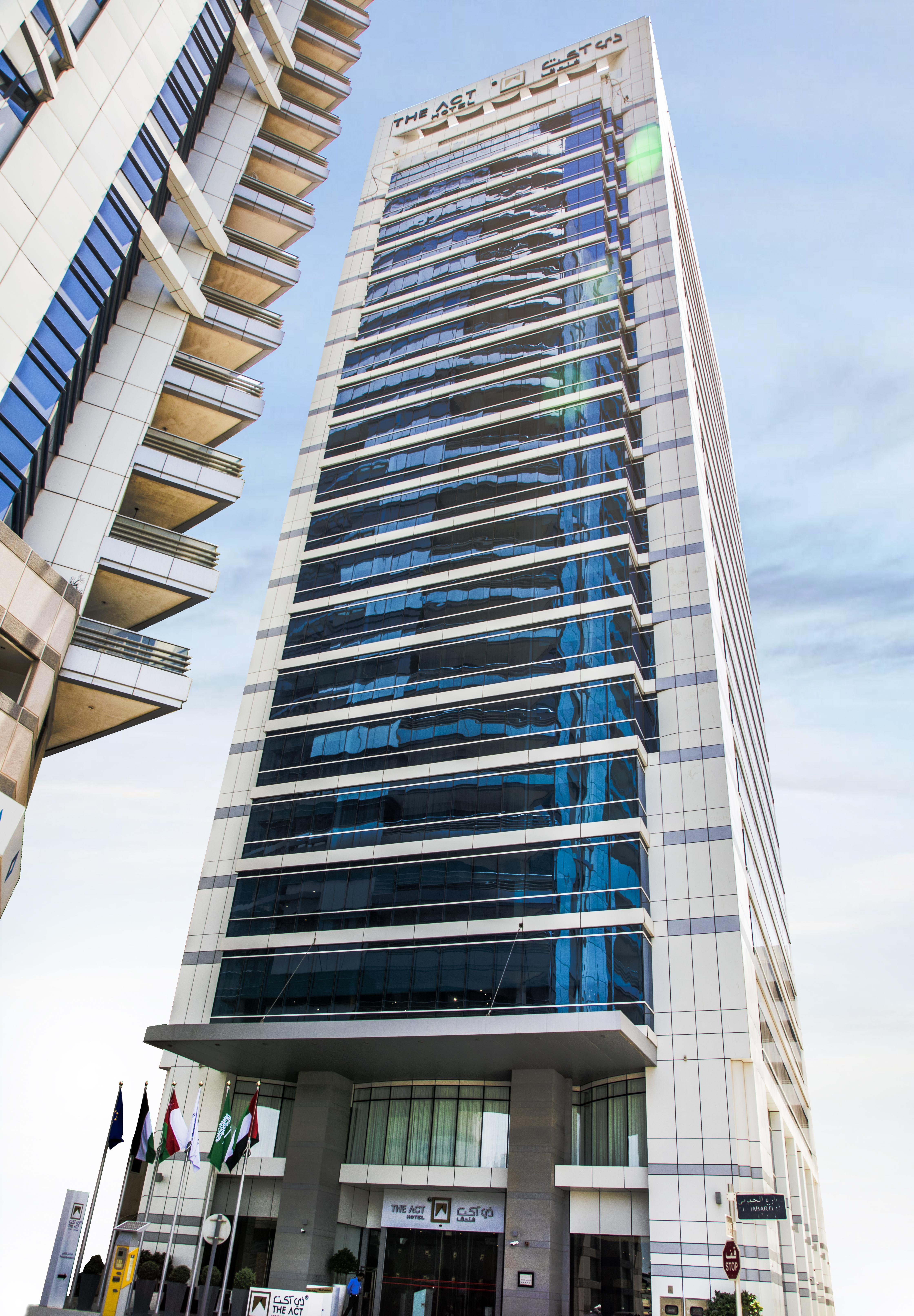 The Act Hotel Шарджа Екстер'єр фото The 100-meter high building of the university