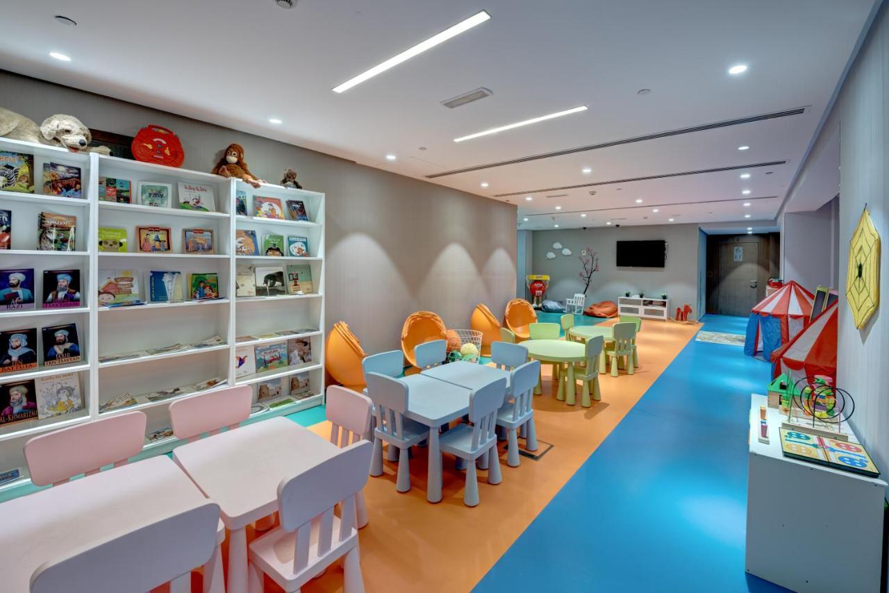 The Act Hotel Шарджа Екстер'єр фото Kids Club