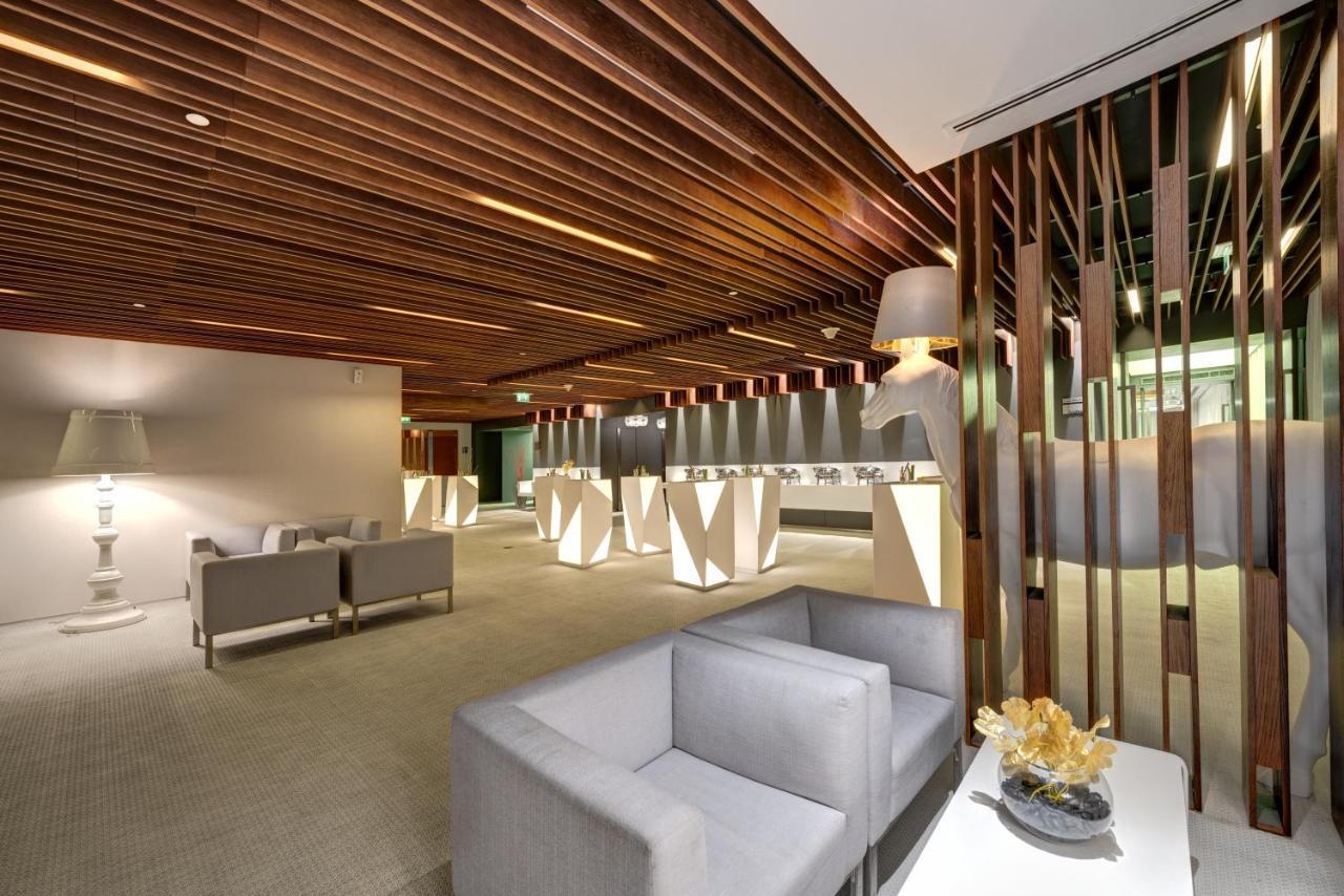 The Act Hotel Шарджа Екстер'єр фото The new lounge at the airport